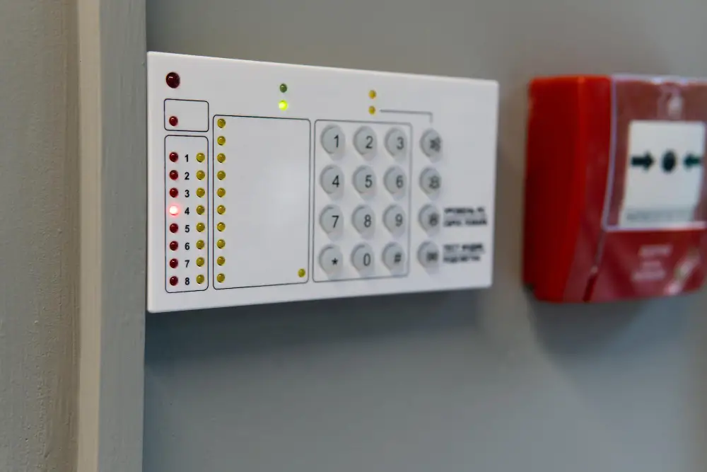 white fire alram unit with numbers